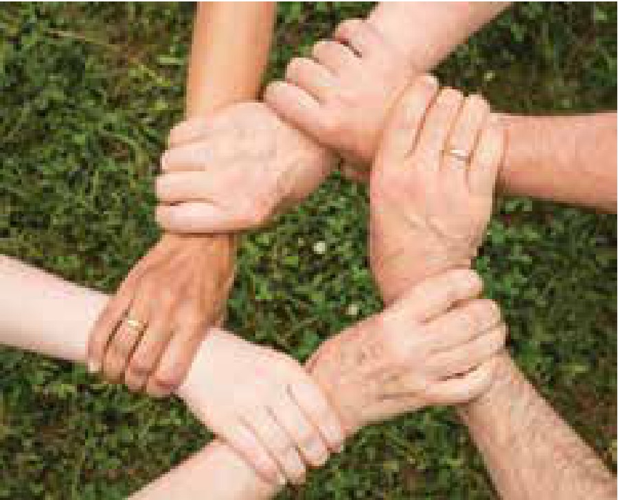 Hands joined together to represent community support